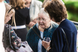 Sally talking with friends at the annual Fellows Dinner